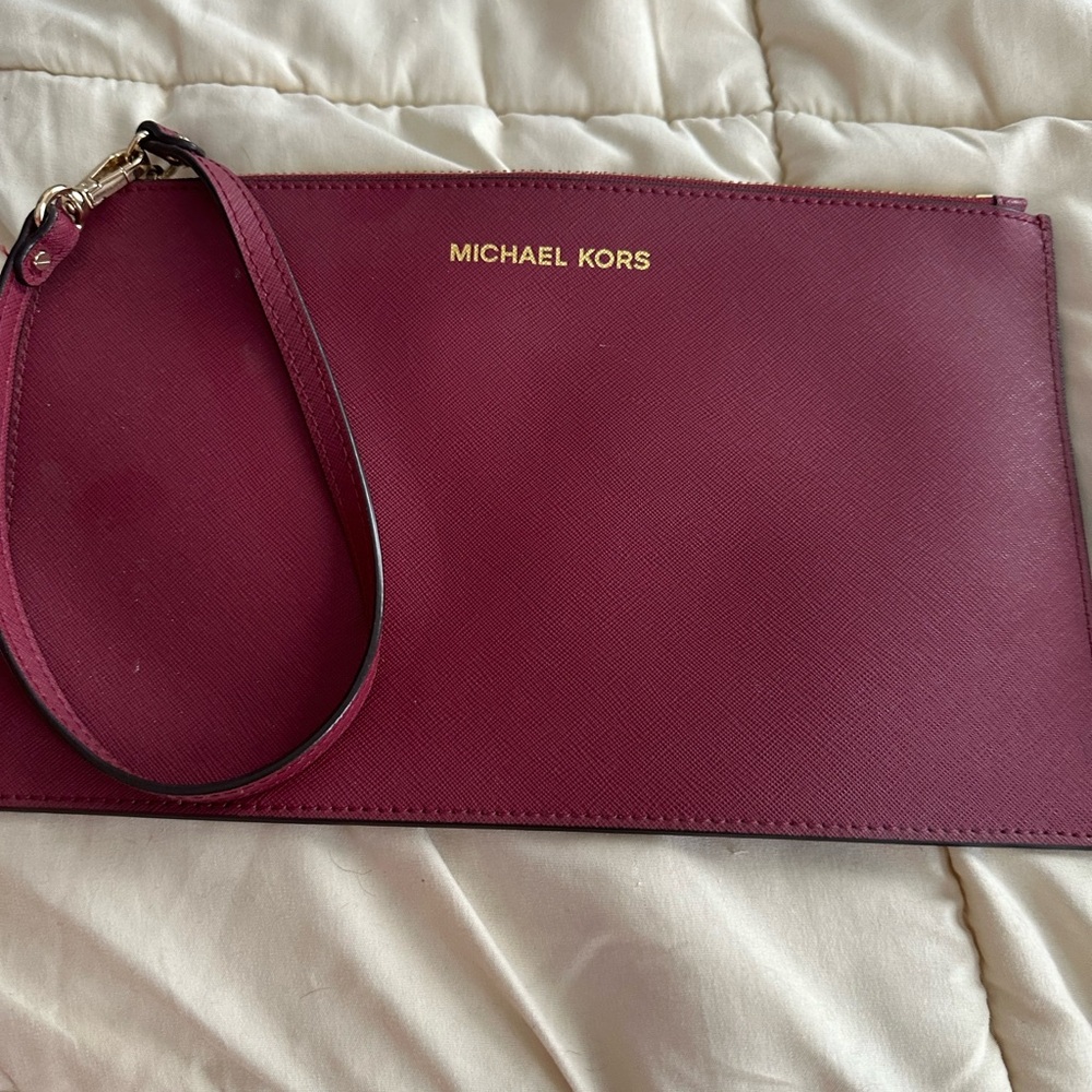 MK wristlet. Red wine color never used
